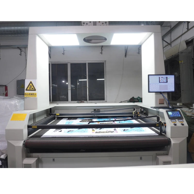 1915 double heads 150W Automatic Feeding Laser Cutting Machine For Fabric Cloths Textile With CCD Camera Positioning